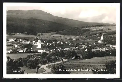 AK Kobersdorf, Blick auf Ort mit Berglandschaft