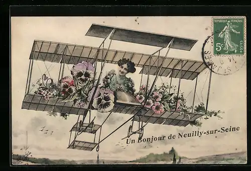 AK Neuilly-sur-Seine, Frau mit Blumen im Flugzeug