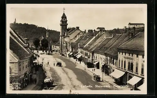 AK Leibnitz, Hauptplatz mit Geschäften und Blick zum Rathaus
