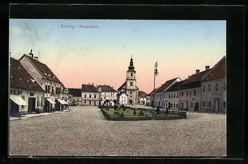 AK Fehring, Ladengeschäfte und Kirche am Hauptplatz