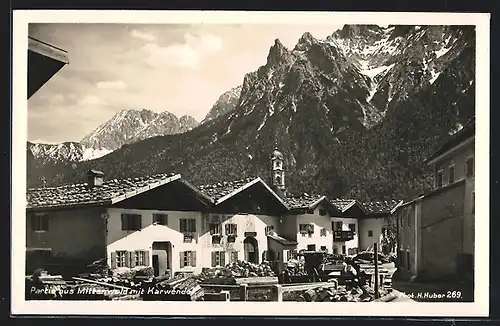 AK Mittenwald, Partie aus der Ortschaft mit Karwendel