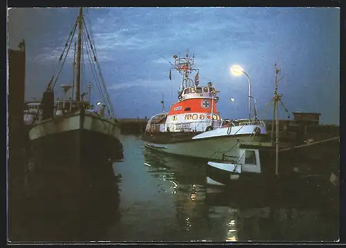 AK Seenotkreuzer mit Tochterboot Georg Breusing im abendlichen Hafen