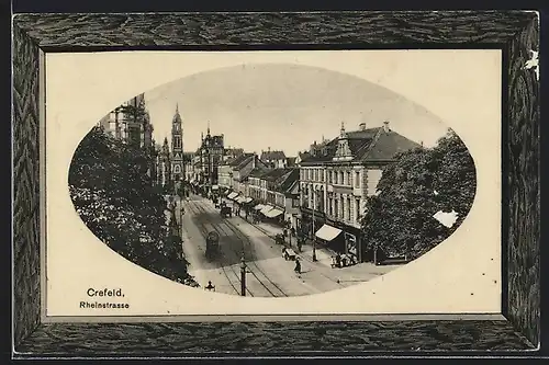 AK Krefeld, Blick in die Rheinstrasse mit Geschäften