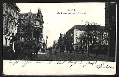 AK Krefeld, Rheinstrasse mit Ostwall und Radfahrer