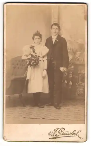 Fotografie Franz Gröschel, Rumburg, junges Geschwisterpaar zur Kommunion im Kleid und im Anzug