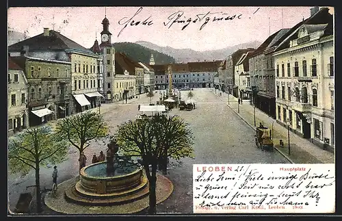 AK Leoben, Hauptplatz mit Geschäften, Denkmal und Brunnen