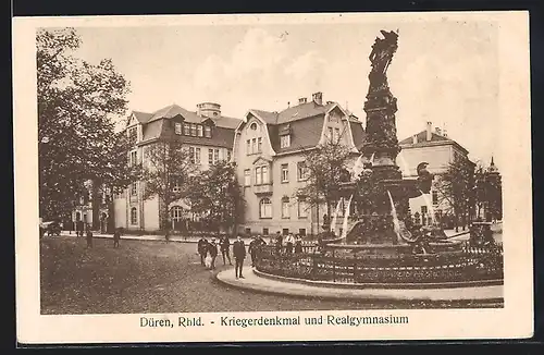 AK Düren, Strassenpartie mit Kriegerdenkmal und Realgymnasium
