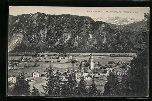 AK Kiefersfelden /Bayern, Ortspartie mit Kirche und Kaisergebirge