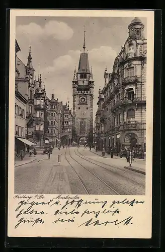 AK Freiburg i. Br., Martinstor mit Hotel und Wiener Schuh-Halle