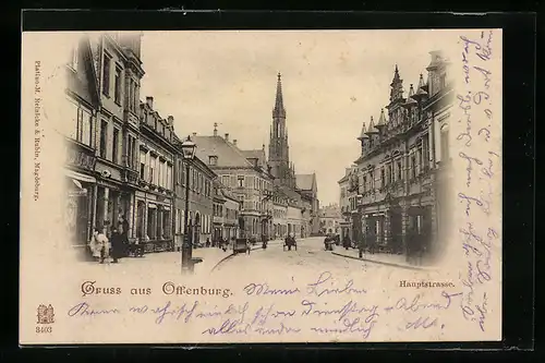 AK Offenburg, Hauptstrasse mit Geschäft und Kirche