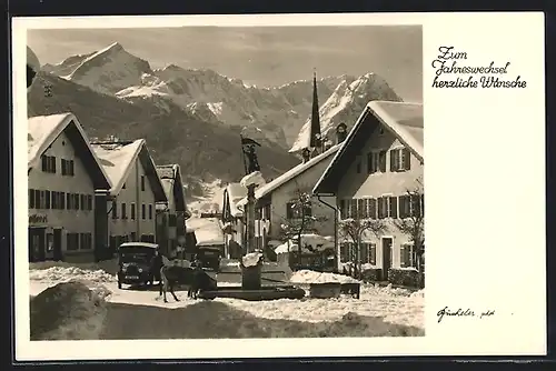 AK Garmisch-Partenkirchen, Strassenpartie mit Brunnen im Schnee, Neujahrsgruss