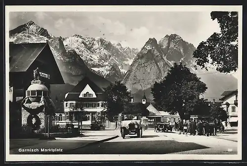 AK Garmisch, Strassenpartie mit Brunnen