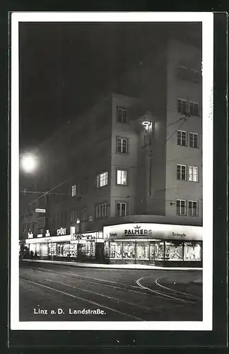 AK Linz a. d. D., Landstrasse mit Geschäftshaus Palmers