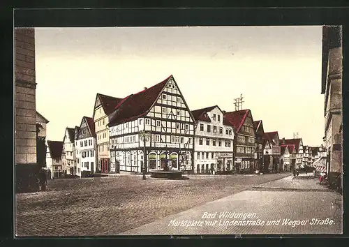 AK Bad Wildungen, Löwenapotheke am Marktplatz mit Lindenstrasse und Wegaer Strasse