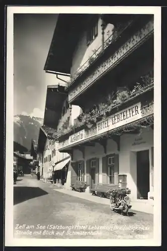AK Zell am See, Hotel Lebzelter, Dreifaltigkeitsstrasse mit Blick auf Schmittenhöhe