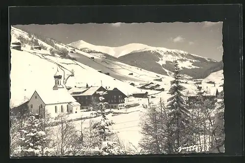 AK Gerlos / Zillertal, Ortspartie mit Kirche im Winter