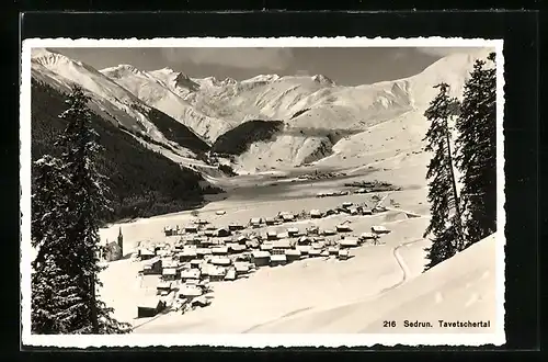 AK Sedrun /Tavetschertal, Teilansicht mit Kirche im Schnee