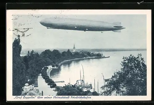 AK Friedrichshafen a. B., Luftschiff LZ127 Graf Zeppelin über seiner Heimatstadt