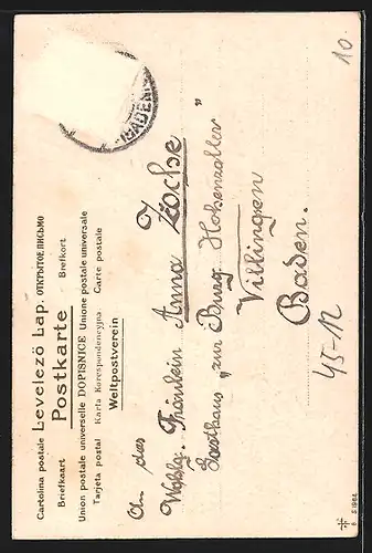 AK Kind fährt Schlitten den Hang hinunter