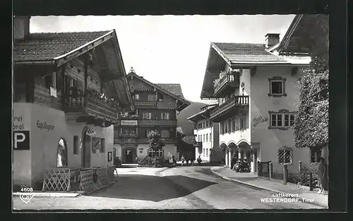 AK Westendorf, Strassenpartie mit Cafe Angerer und Messnerwirt