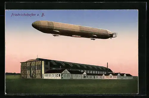 AK Friedrichshafen, Zeppelin im Abendlicht über der Luftschiffwerft