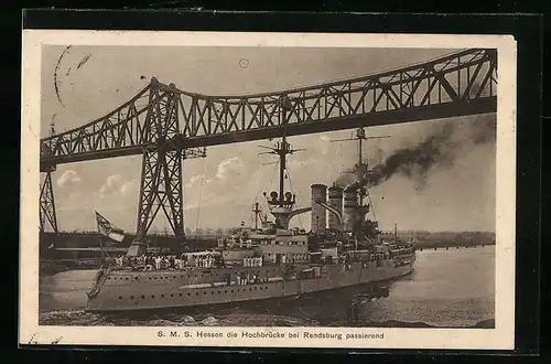 AK Rendsburg, S. M. S. Hessen die Hochbrücke passierend