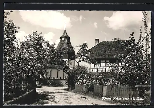 AK Rümlang, Ortspartie mit Kirche im Frühling