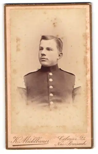 Fotografie K. Mühlbauer, Colmar i. Els., Soldat in Uniform Musiker mit Schwalbennest
