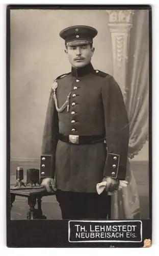 Fotografie Th. Lehmstedt, Neubreisach / Els., Soldat in Uniform Rgt. 172 mit Schützenschnur
