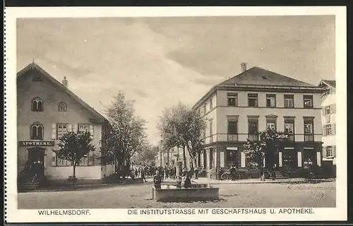 AK Wilhelmsdorf, Institutsstrasse mit Geschäftshaus u. Apotheke