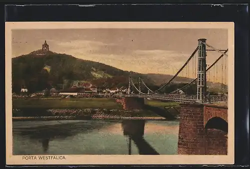 AK Porta-Westfalica, Ortspartie am Fluss mit Kettenbrücke