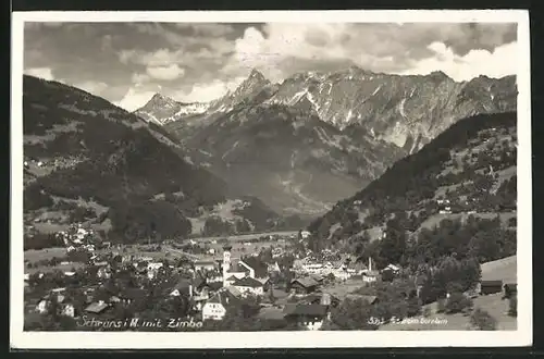 AK Schruns i. M., Panoramablick auf Ort und Zimba