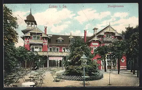 AK Löbau i. Sa., Gasthaus Honigbrunnen mit Terrasse