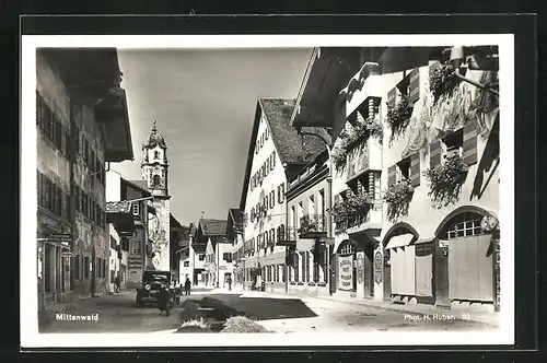 AK Mittenwald, Ortsansicht mit Bäckerei und Kirchturm