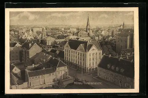 AK Mitau, Ortsansicht mit Strasse und Kirchturm