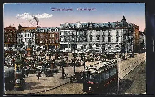 AK Wilhelmshaven, Strassenbahn und Litfasssäule am Bismarckplatz