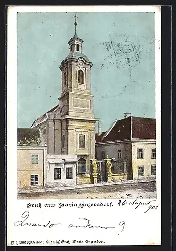 AK Maria-Enzersdorf, Strassenpartie mit Kirche