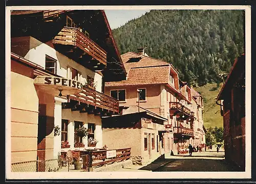 AK Mallnitz, Strassenpartie mit Gasthaus