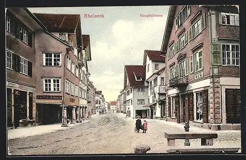 AK Rheineck, Hauptstrasse mit Buchbinderei und Schmuckeschäft J. Tschudi