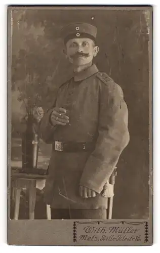 Fotografie Wilh. Müller, Metz, Soldat in Feldgrau Uniform Rgt. 16 mit Krätzchen
