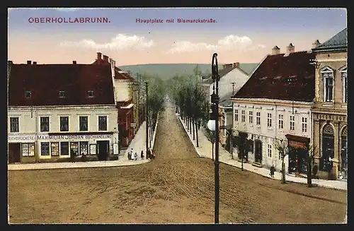 AK Oberhollabrunn, Hauptplatz und Bismarckstrasse mit Buchhandlung Maximilian Jordan