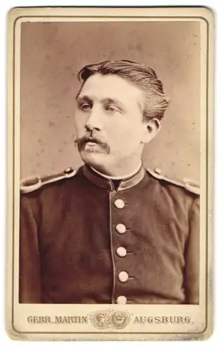 Fotografie Gebr. Martin, Augsburg, Portrait Soldat in Uniform mit Schnurrbart
