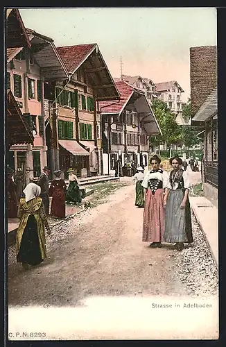 AK Adelboden, Frauen in Tracht auf einer Strasse im Ort