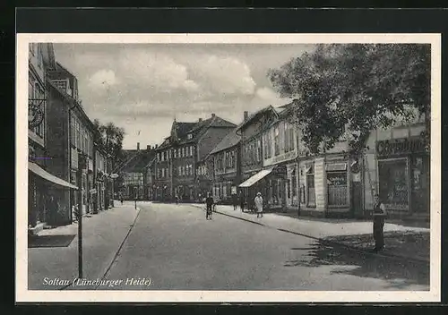 AK Soltau, Blick in Strasse mit Ladengeschäft