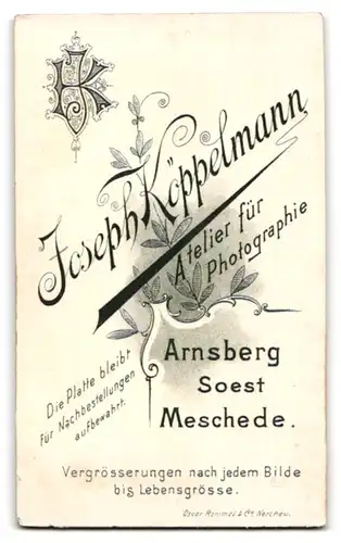 Fotografie Joseph Köppelmann, Arnsberg, Portrait stattlicher Herr mit Fliege und Schnauzbart