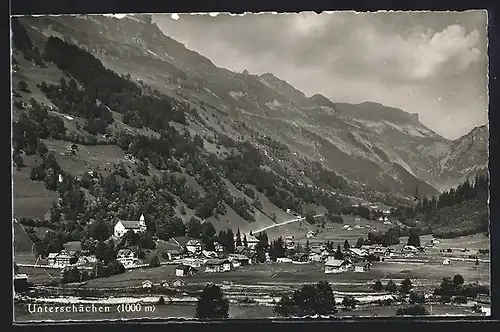 AK Unterschächen, Teilansicht mit Bergen
