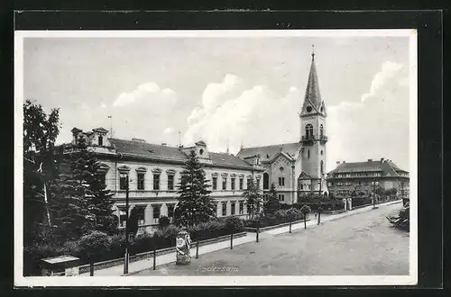 AK Podersam, Strassenpartie mit Kirchturm