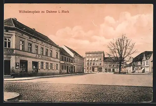 AK Dahme i. Mark, Wilhelmsplatz mit Geschäften