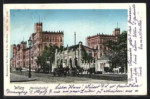 Goldfenster-AK Wien, Nordbahnhof mit leuchtenden Fenstern, Pferdekutschen