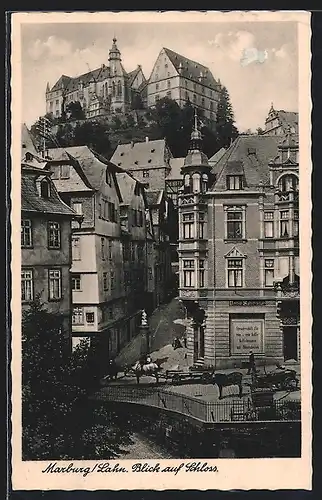 AK Marburg /Lahn, Blick auf Schloss mit Geschäft von Ernst Schwaner